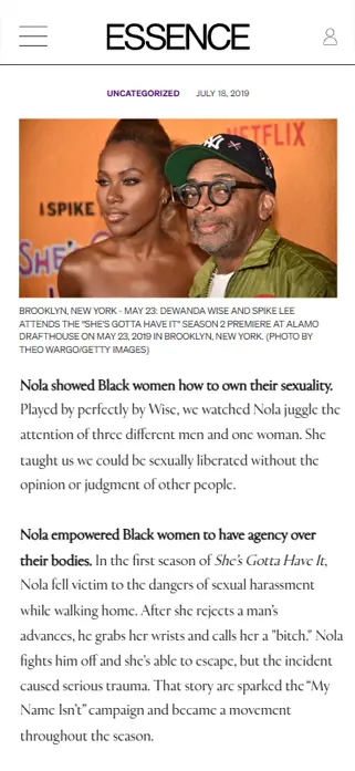 Two people smiling together on an orange step-and-repeat backdrop with partial logos, cropped Essence article screenshot showing headline text and a vertical mobile browser frame.