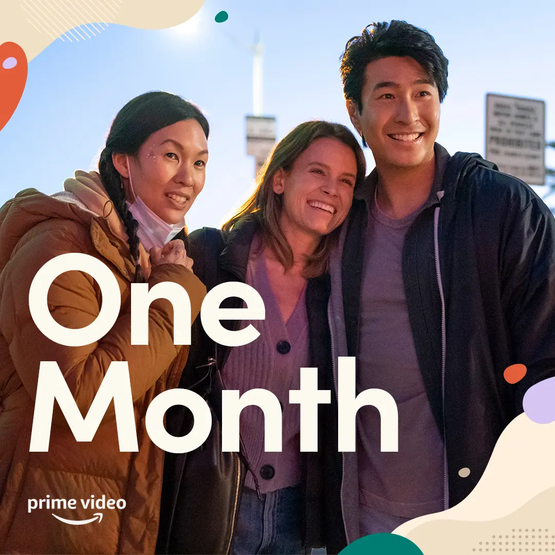 Three smiling young adults huddle close outside at dusk, with the oversized word 'One Month' in white across the lower left and a small Prime Video logo in the corner.