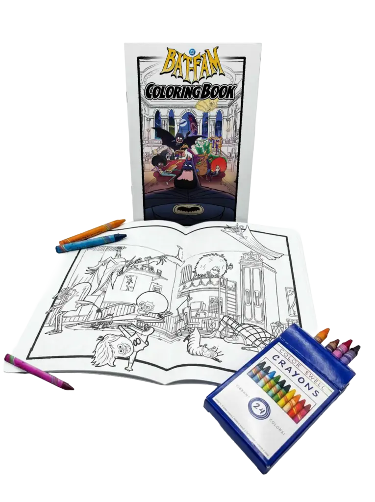 Bat‑Fam coloring book standing upright behind an open two‑page black-and-white family-room line drawing, with scattered crayons and a blue crayon box on a white background.