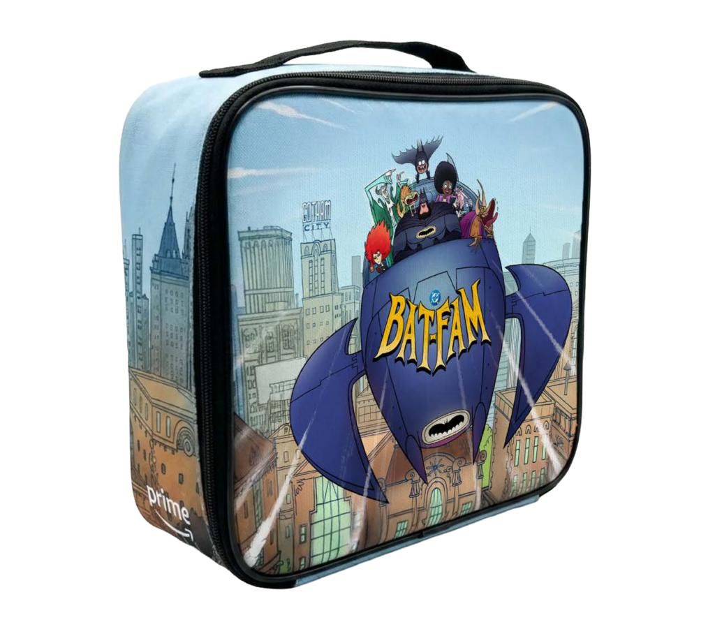Glossy zippered lunch box showing the Bat‑Fam characters riding a stylized blue Batboat over a cartoon Gotham skyline, with a bold yellow Bat‑Fam logo on the boat's nose.