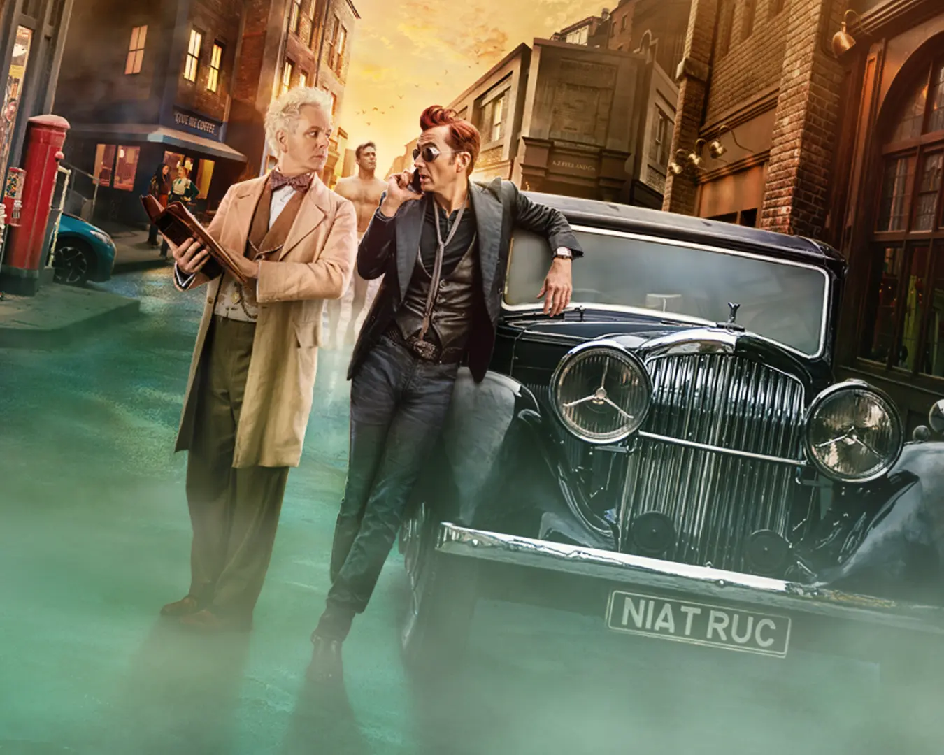 A mint-tinged Soho street scene with Aziraphale holding a book, Crowley leaning on a vintage black car while speaking on a phone and green fog rolling at their feet.