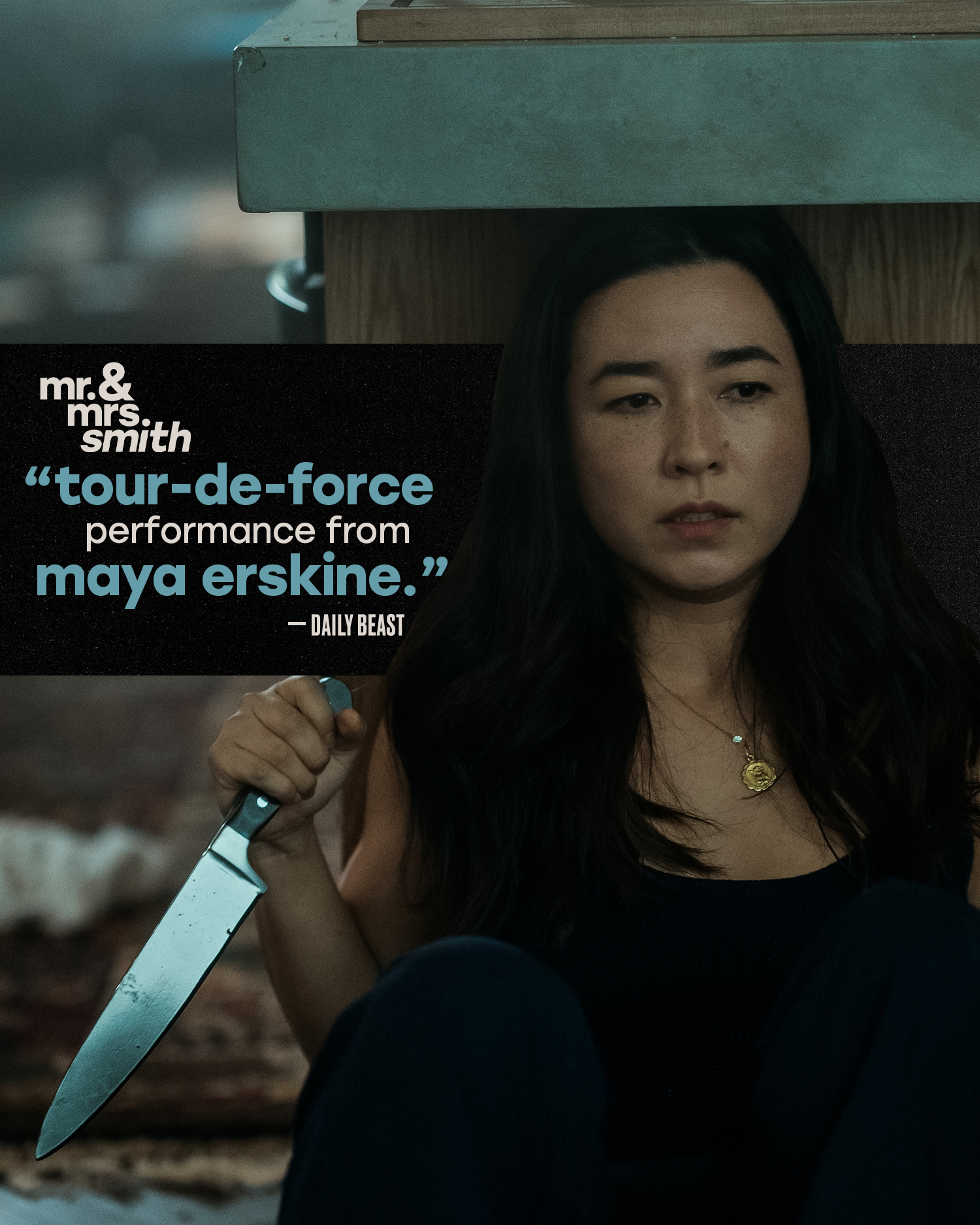 Maya Erskine seated on the floor under a table clutching a large kitchen knife, with a black horizontal quote bar to the left reading "tour-de-force performance from maya erskine."