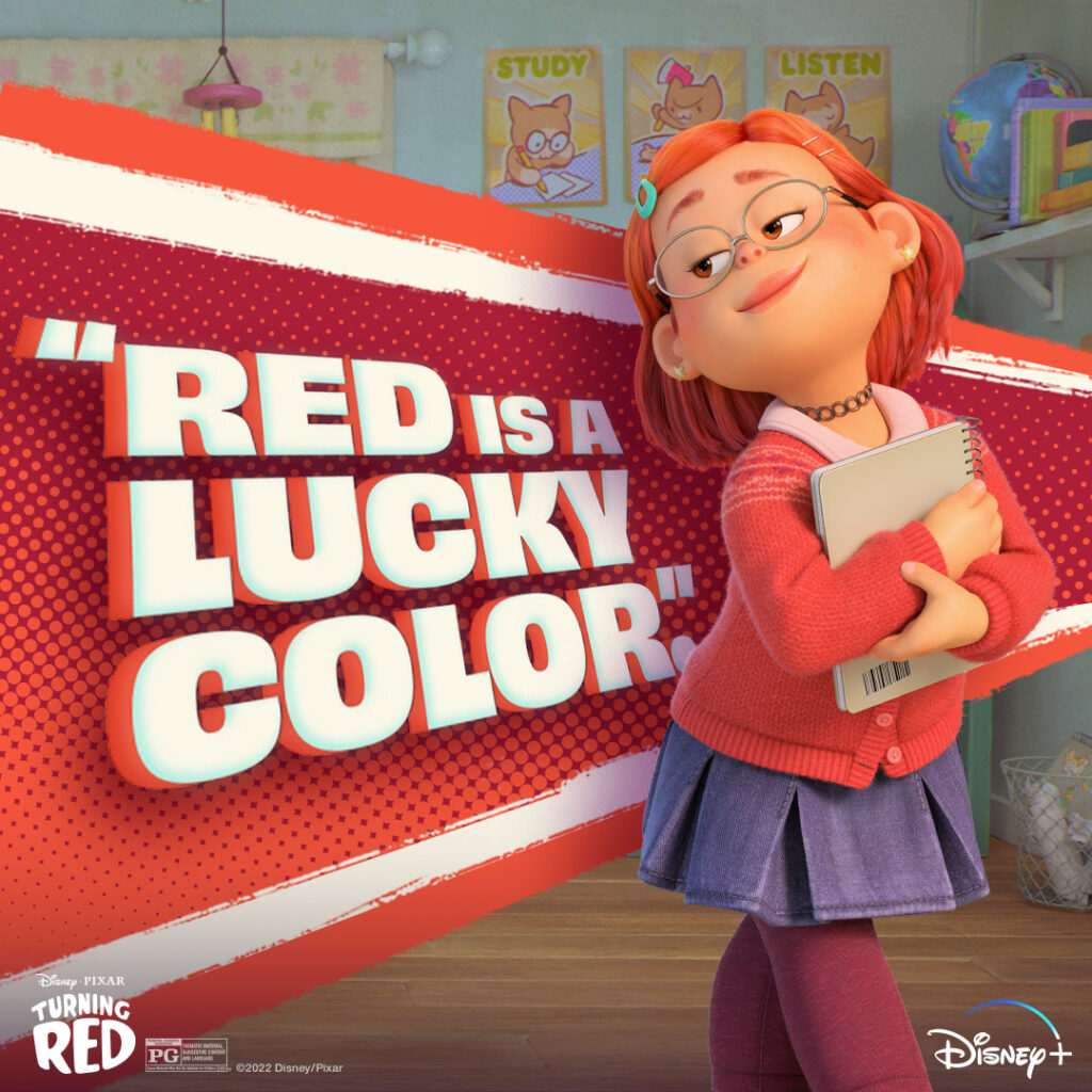Meilin “Mei” Lee stands in a classroom clutching a notebook and smiling confidently beside a bold red graphic that reads “RED IS A LUCKY COLOR,” with Turning Red and Disney+ logos.