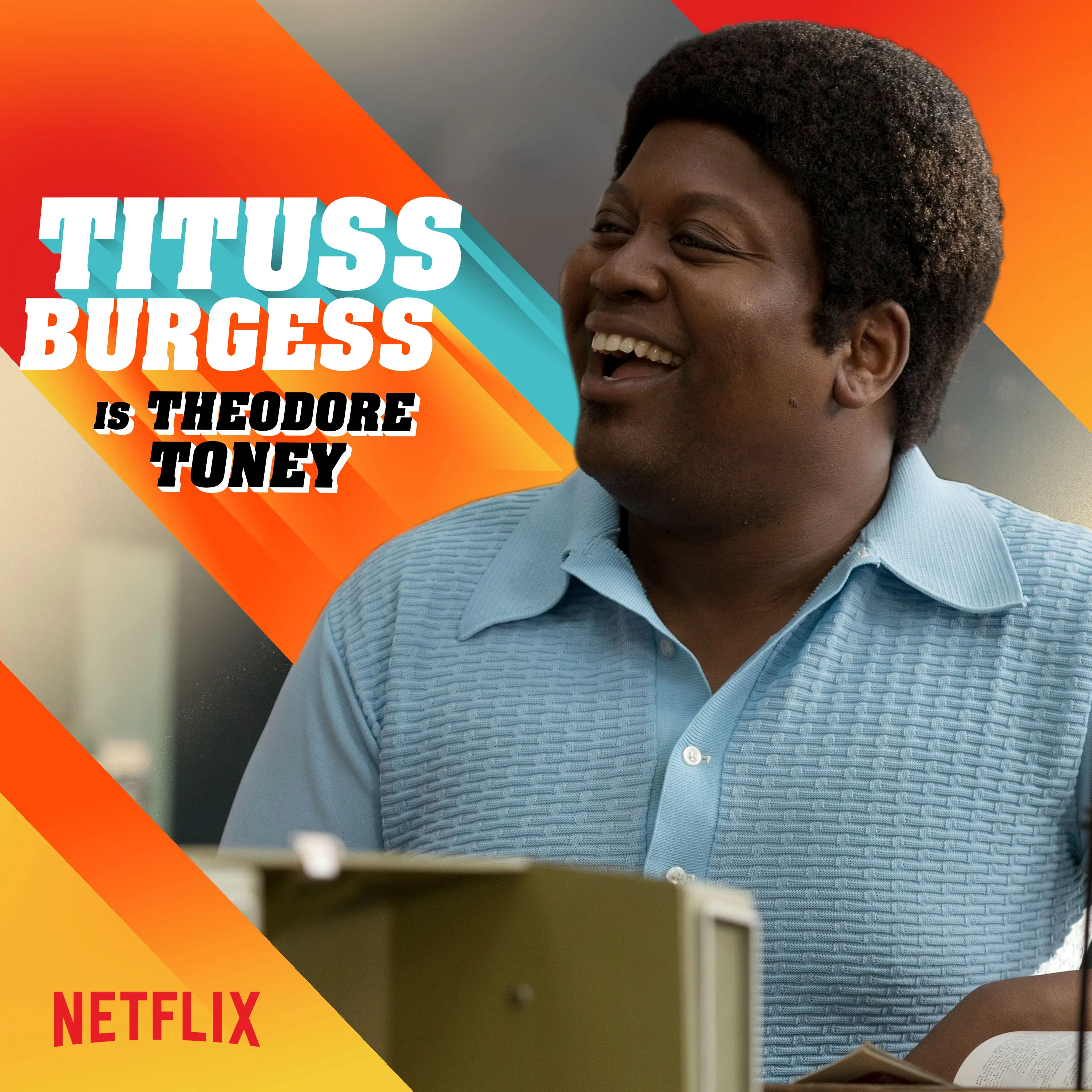 Smiling Tituss Burgess in a textured powder-blue 1970s shirt, framed on the right, with bold diagonal orange-to-teal 3D typography on the left naming the actor and character.