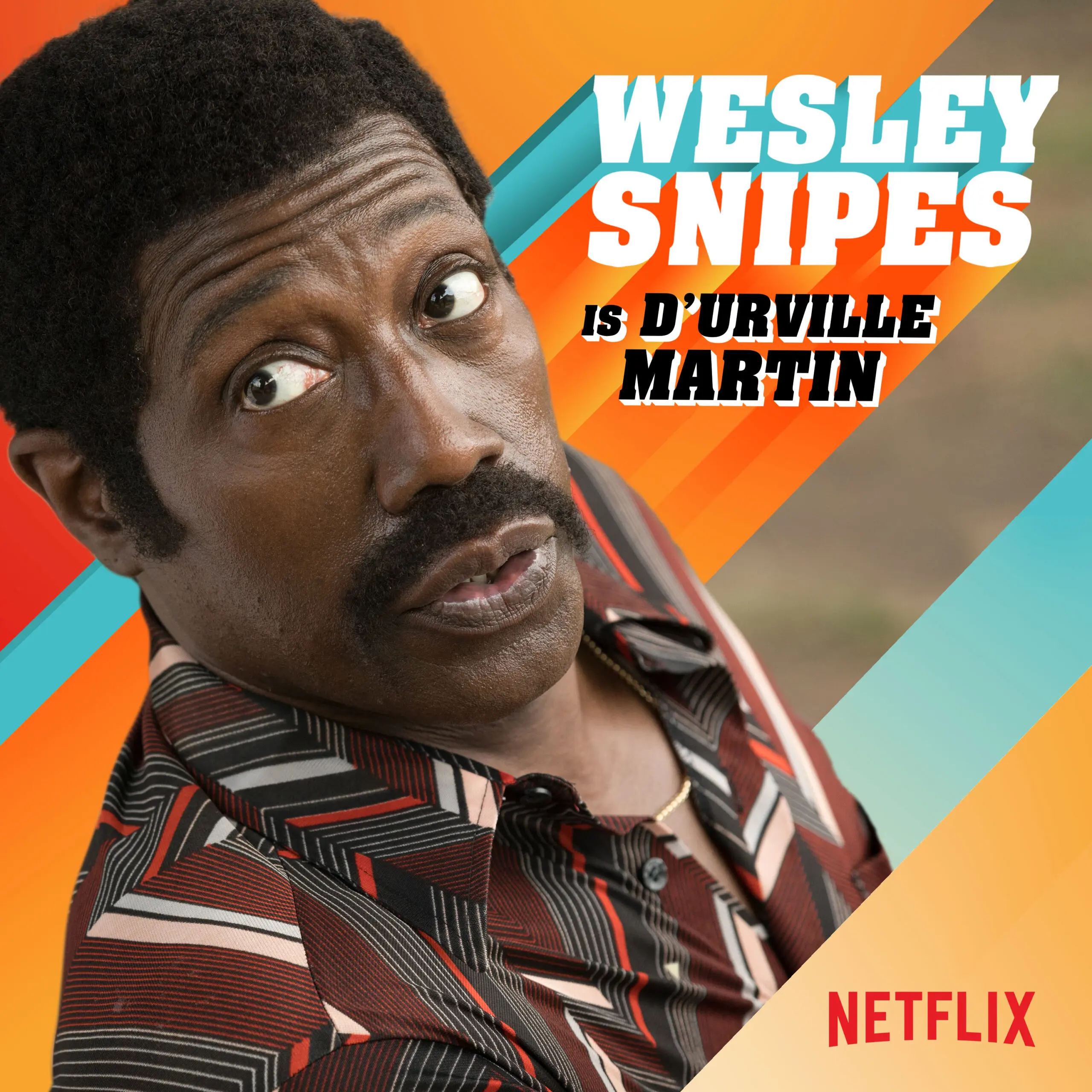 Close-up three-quarter portrait of D'Urville Martin in a patterned 1970s shirt and mustache, looking sideways against diagonal orange and teal retro stripes with bold typography and a Netflix logo.